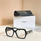 Square eyeglasses with black frames and gold temple emblem details