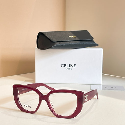 Celine glasses with red square frames and clear lenses.