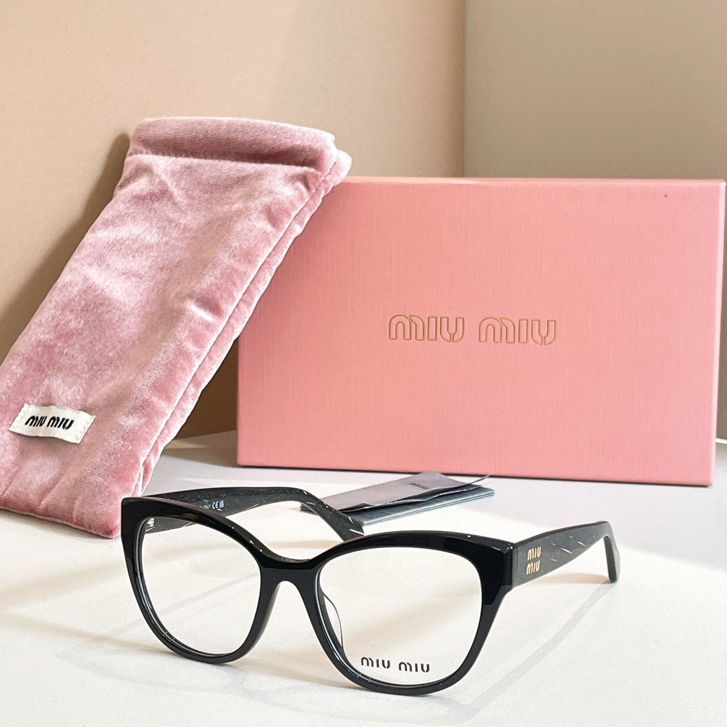 MiuMiu black rectangular eyeglasses, full-rim frame, logo temple, clear lenses