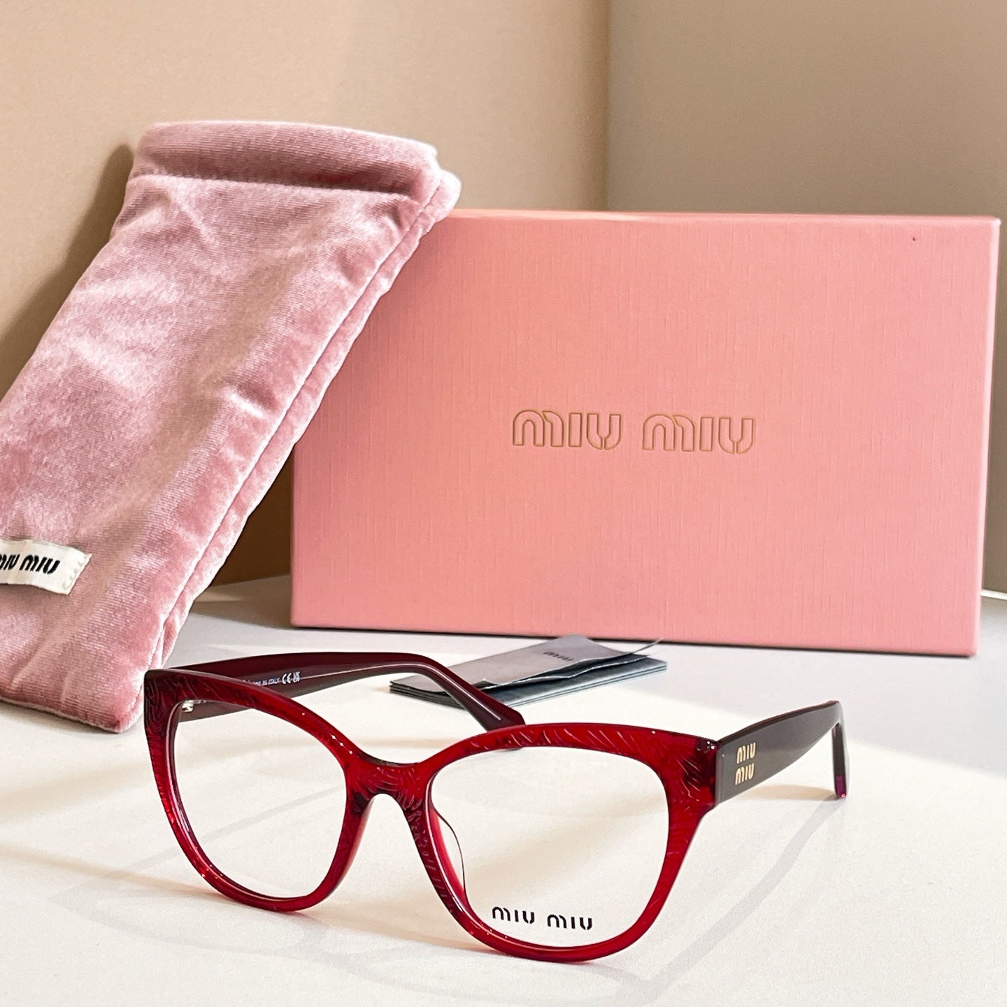 MiuMiu deep red rectangular eyeglasses, full-rim frame, logo temple, clear lenses