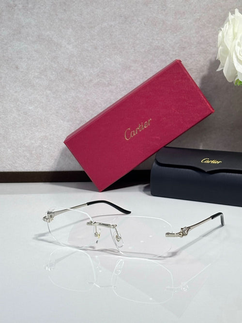 Cartier eyeglasses with clear lenses and thin gold metal frames