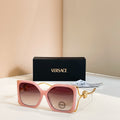Versace sunglasses, pink square frames with gold Medusa temple detail, tinted lenses
