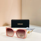 Versace sunglasses, pink square frames with gold Medusa temple detail, tinted lenses