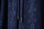 Navy patterned shorts with all-over signature-style motifs