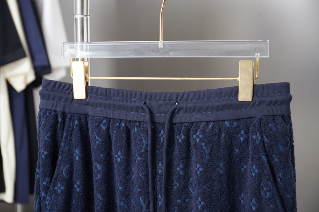 Navy patterned shorts waistband with drawstring and stitched elastic