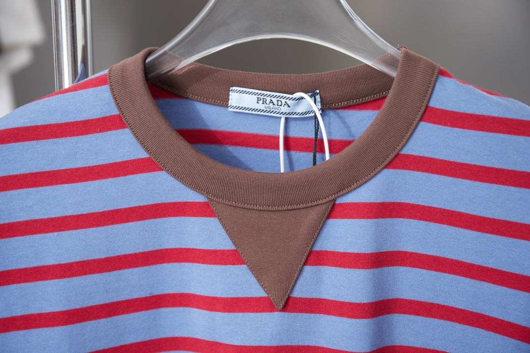 Prada striped polo collar detail, light blue and red stripes with brown trim