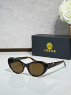 Versace tortoise sunglasses with brown lenses and metal front details