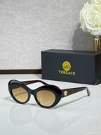 Versace sunglasses with black round frames and tan gradient lenses