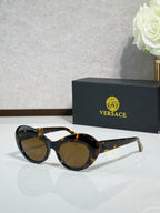 Versace sunglasses with black frames and brown gradient lenses