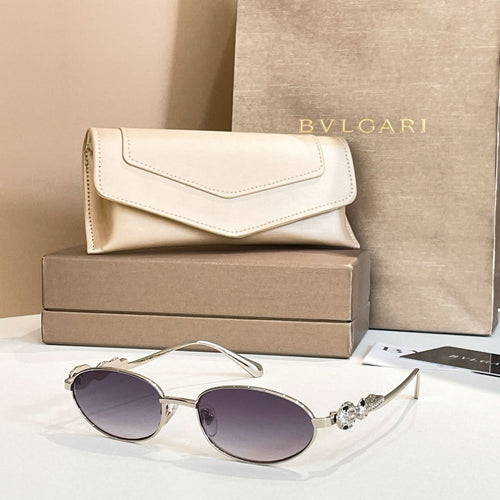 Bvlgari sunglasses with round purple lenses and silver-tone frames, shown with case