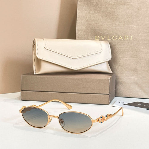 Bvlgari sunglasses with round dark lenses and gold-tone frames, shown with case