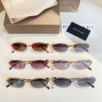 Assorted Bvlgari sunglasses set with round frames in several colors, shown with case