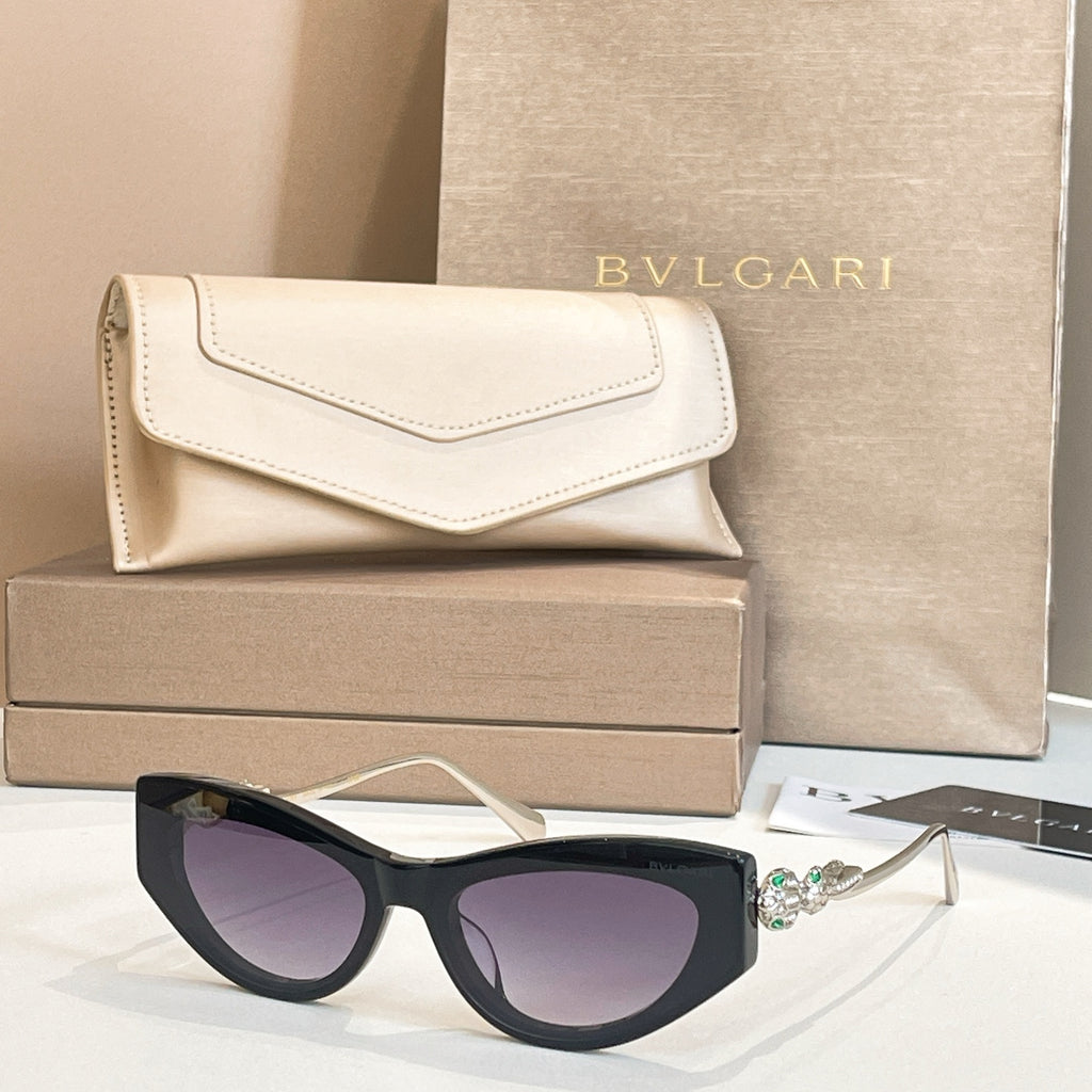 Bvlgari cat-eye sunglasses, black frame with dark lenses and light gold arms