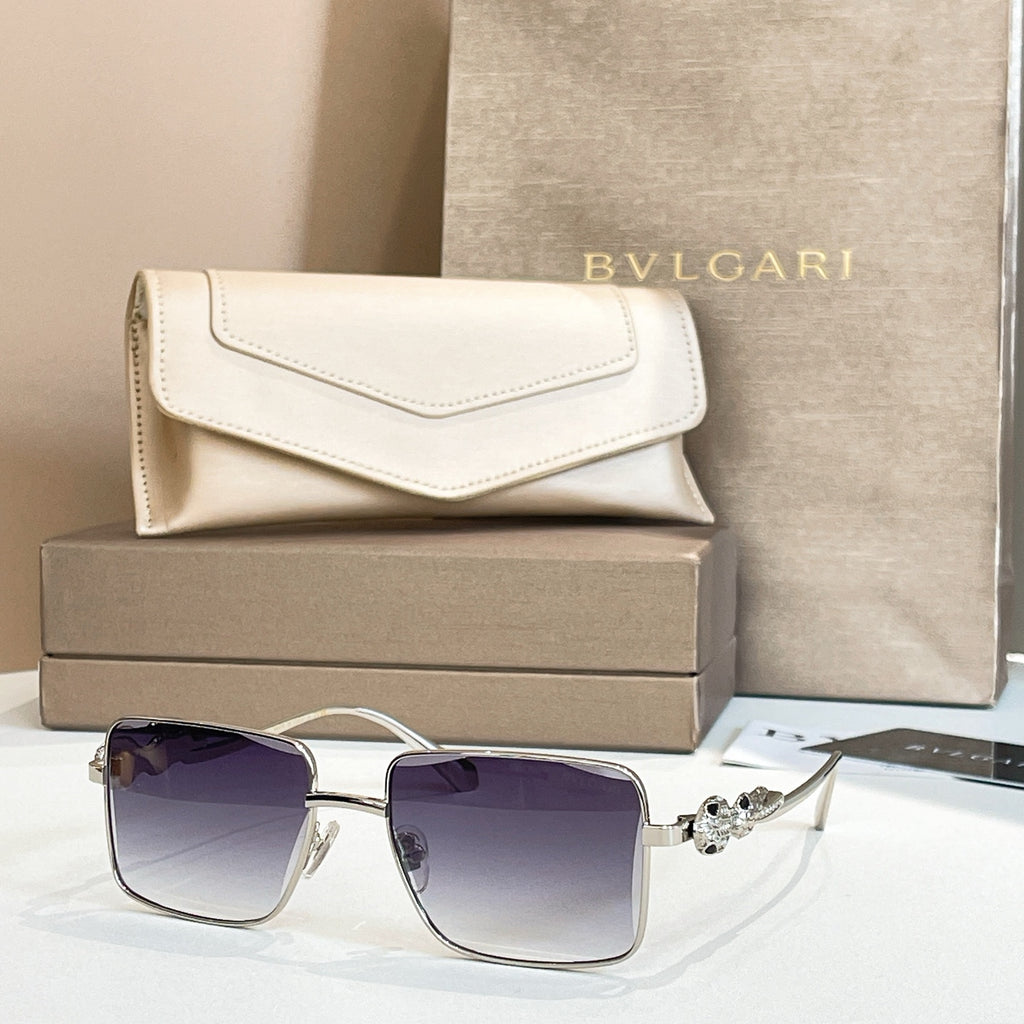 Silver-trim square sunglasses with dark purple gradient lenses and jeweled temple detail