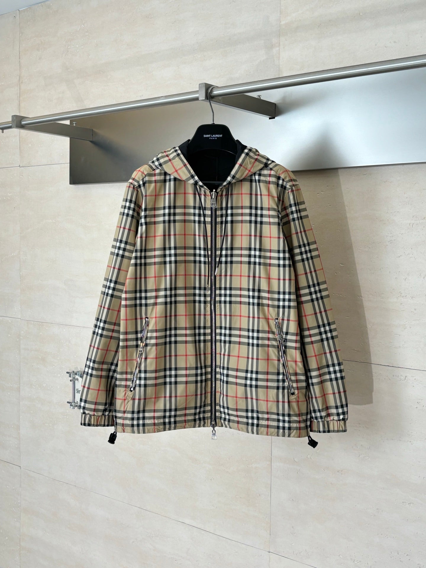 Burberry hooded jacket in plaid with front zipper and drawstring hem