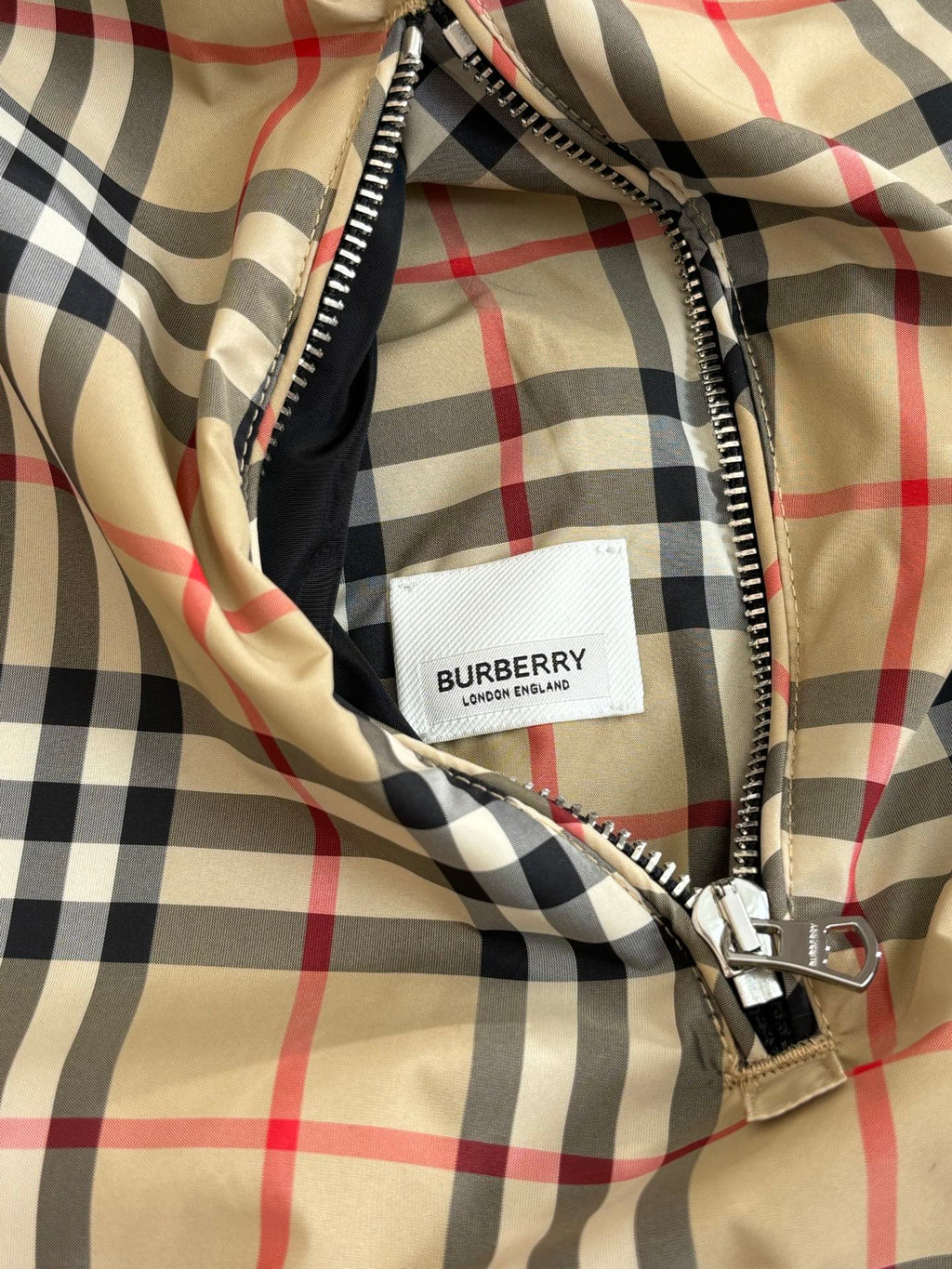 Burberry check long jacket with front zipper and hood lining, black beige red