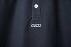 Gucci polo shirt chest logo on navy fabric with buttoned placket