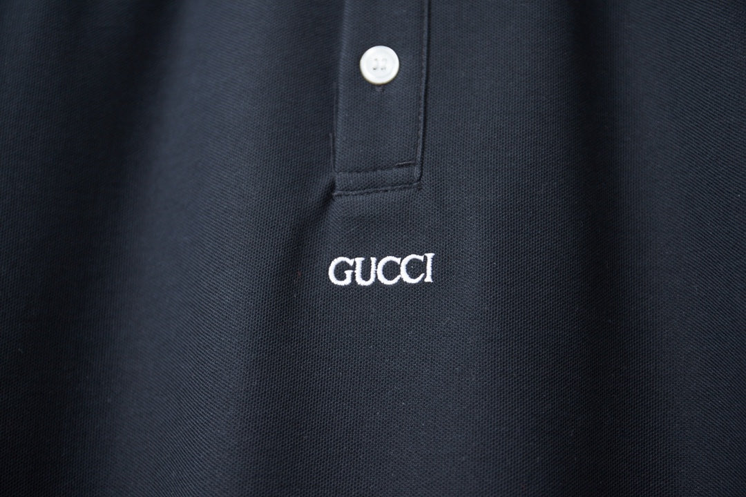 Gucci polo shirt chest logo on navy fabric with buttoned placket