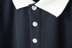 Gucci polo shirt placket with white buttons and white ribbed collar in navy