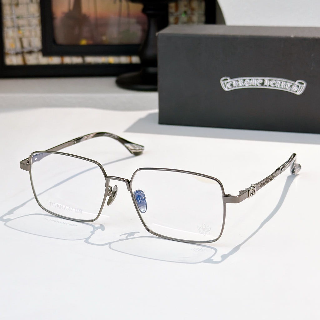 Chrome frame rectangular eyeglasses with blue temples and clear lenses, side view