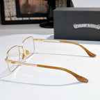 Gold rectangular eyeglasses with long amber temples and clear lenses, side view