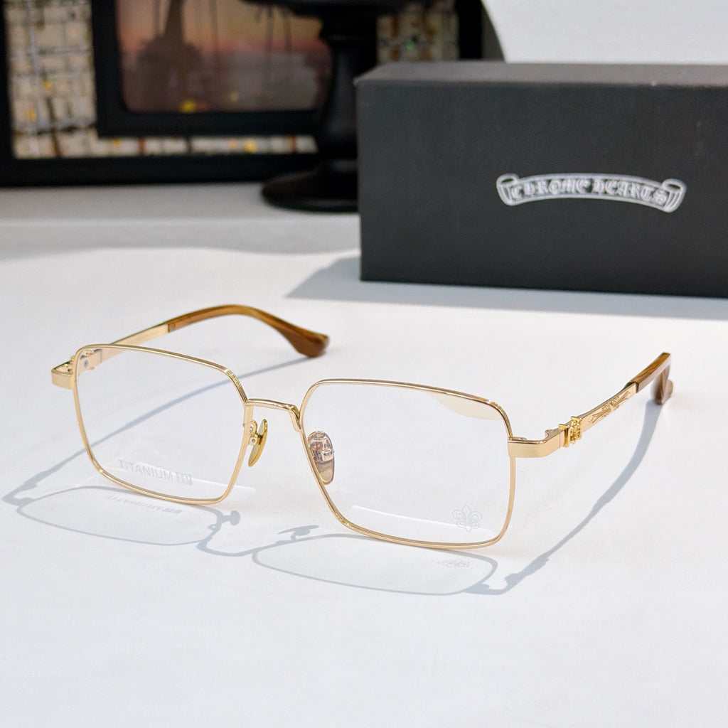 Gold frame rectangular eyeglasses with amber temples and clear lenses