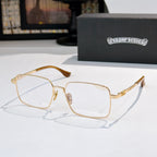 Gold frame rectangular eyeglasses with amber temples and clear lenses