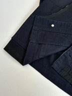 Prada long jacket side and pocket close-up in dark navy with button detail
