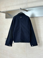 Prada long jacket in dark navy, front view with button placket and cuffs