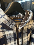 Hooded sweatshirt neckline with printed Louis Vuitton label inside and plaid fabric