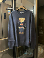 Navy knit sweater with teddy bear, American flag, and small bear graphic