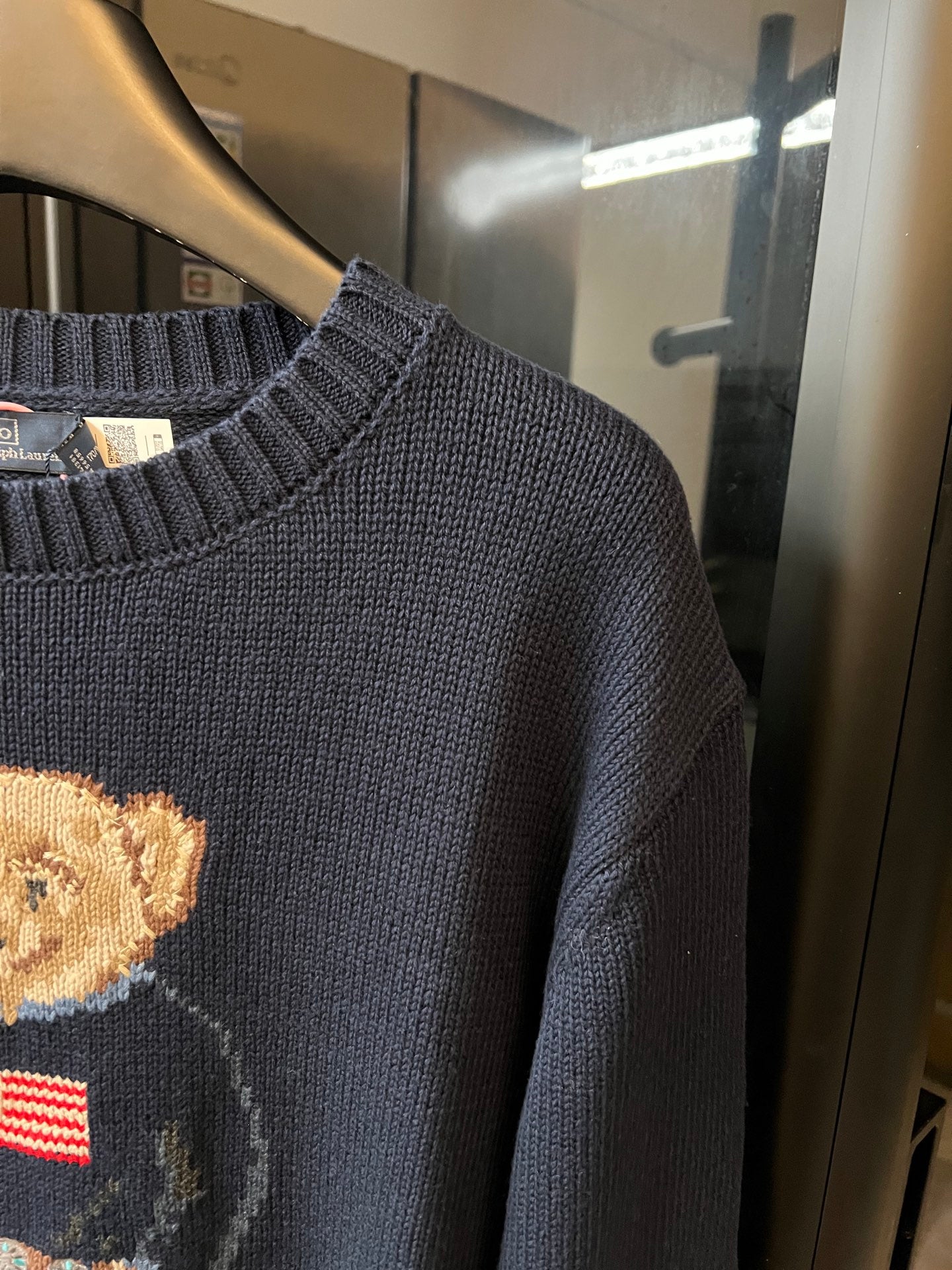 Navy knit sweater shoulder and sleeve knit with ribbed crew neckline
