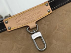 Louis Vuitton bag strap plate with text and ring clasp attached to beige monogram