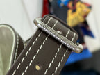 Dark leather strap end with silver hardware and stitched panel for Louis Vuitton bag