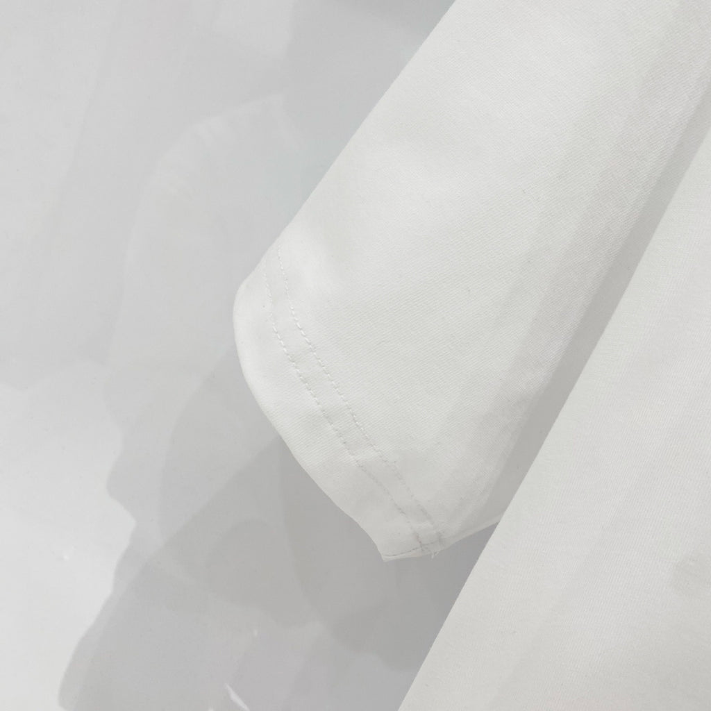 White Amiri T-shirt sleeve and hem with stitched seams