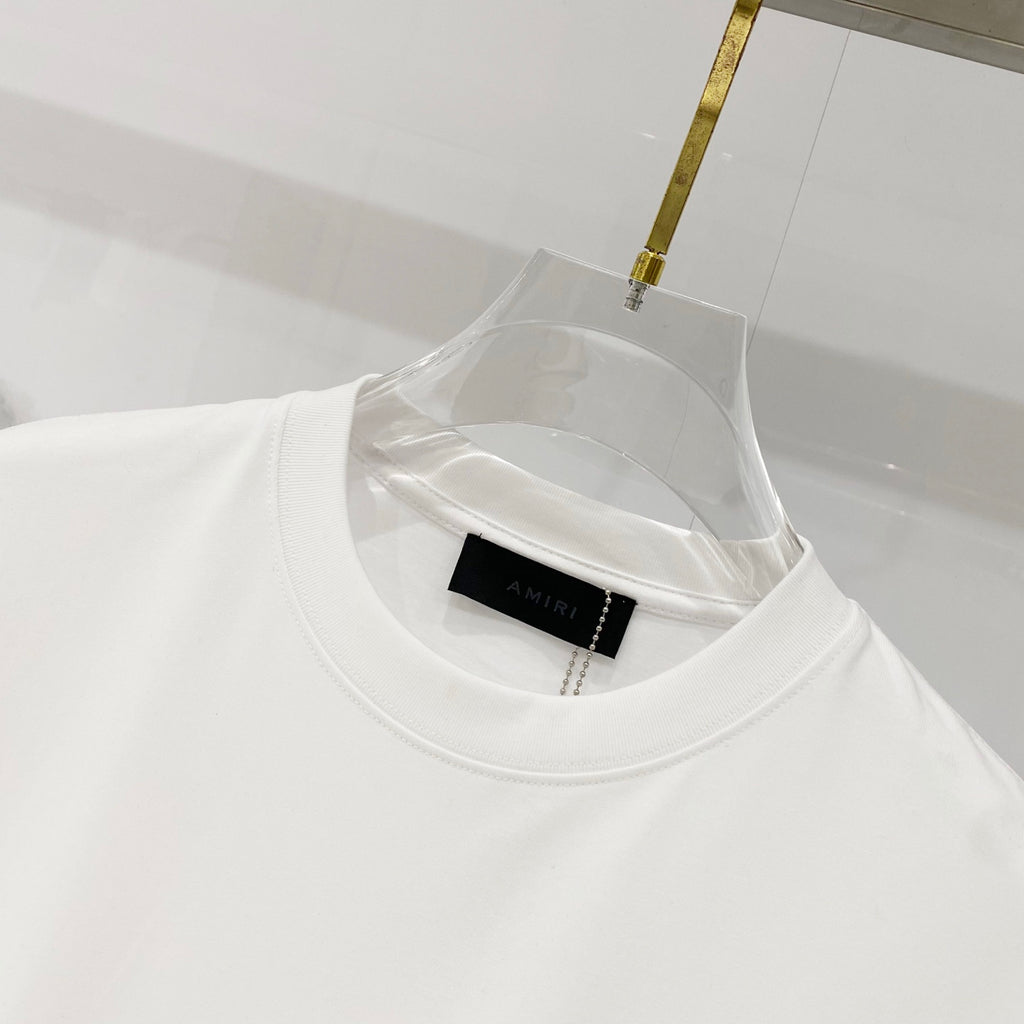 White Amiri T-shirt with round crew neck and inner brand label