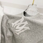 Amiri heather gray crewneck T-shirt with white graphic motif on front
