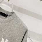 Amiri heather gray crewneck T-shirt with short sleeves and side seam detail