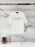 White crewneck T-shirt with AMIRI logo print on the front