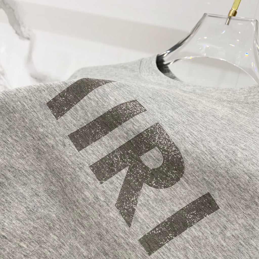 Amiri heather gray T-shirt with AMIRI logo detail on chest