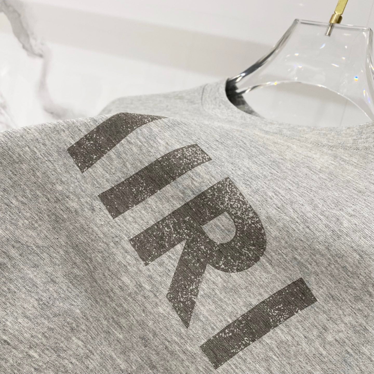 Amiri heather gray T-shirt with AMIRI logo detail on chest