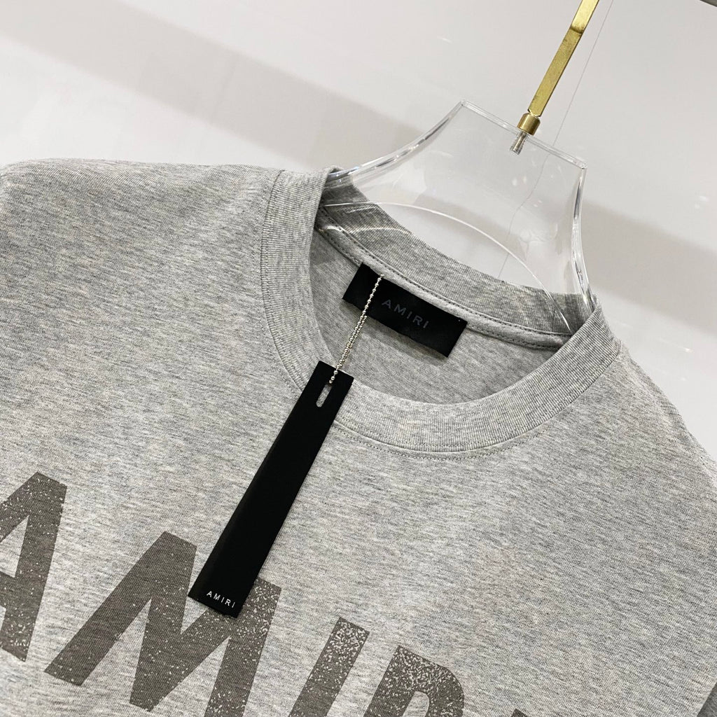 Amiri crew-neck T-shirt in heather gray with black size label at neckline