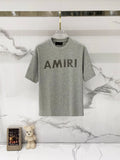 Amiri crew-neck T-shirt in heather gray with large AMIRI logo print