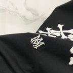 Black crewneck T-shirt with small white crest logo detail