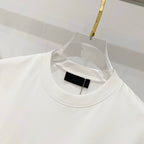 Amiri white T-shirt neckline with black size label inside collar