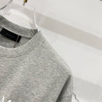 Heather gray Amiri T-shirt crew neck and upper chest fabric texture