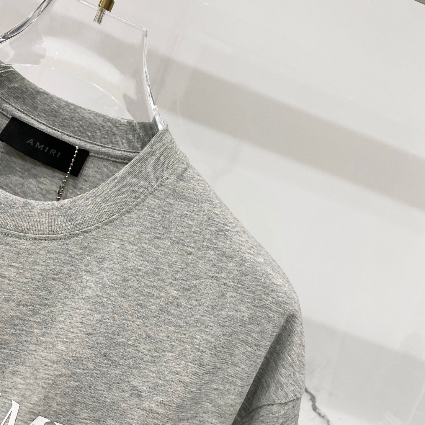 Heather gray Amiri T-shirt crew neck and upper chest fabric texture