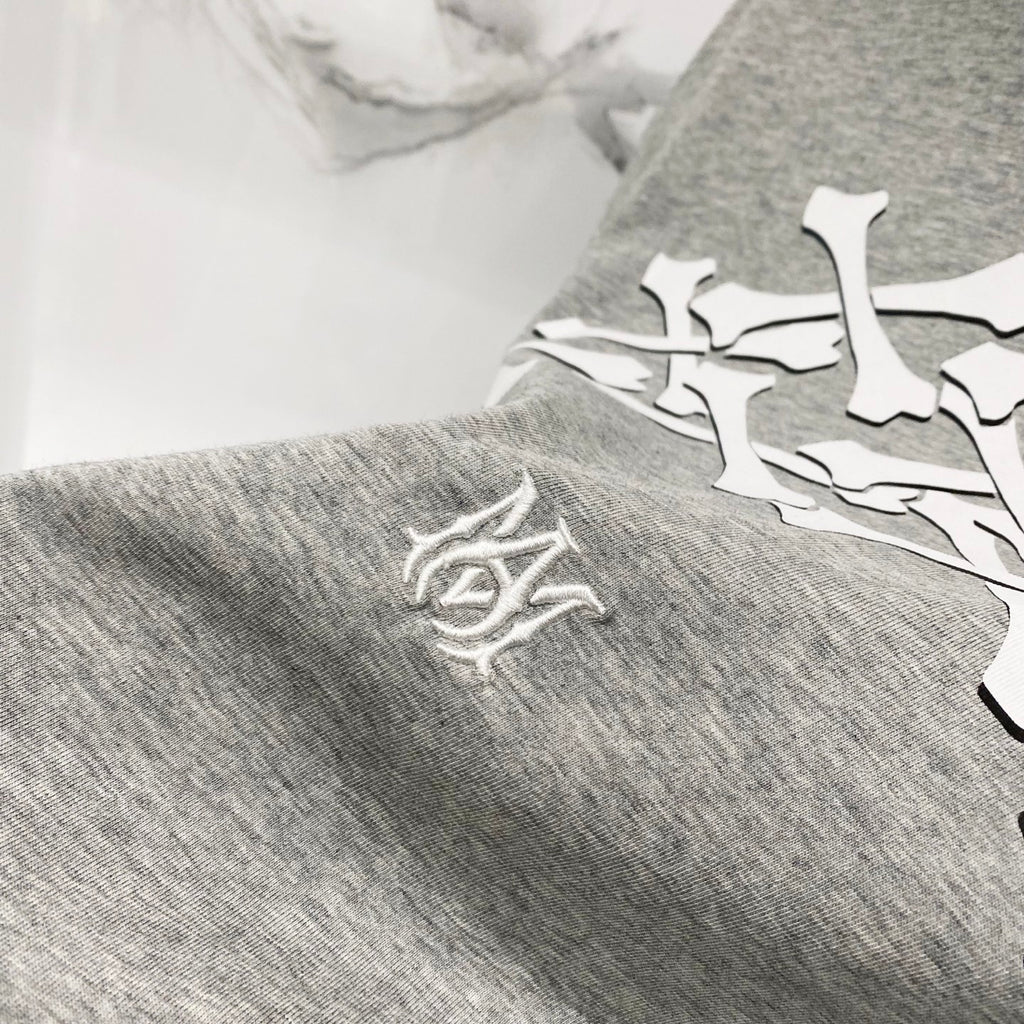 Heather gray Amiri T-shirt with small logo crest on sleeve