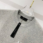 Heather gray Amiri T-shirt neckline with black size label tag inside