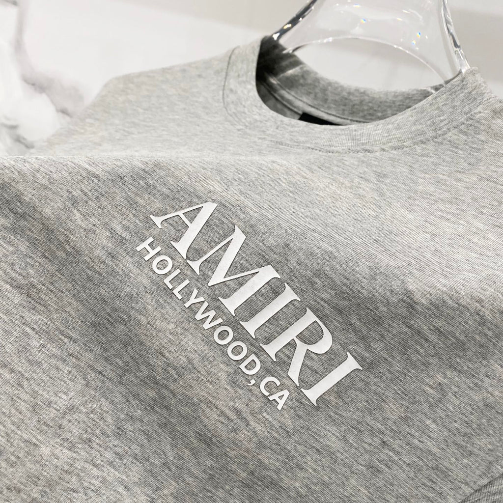 Heather gray Amiri T-shirt with HOLLYWOOD CALIFORNIA text graphic